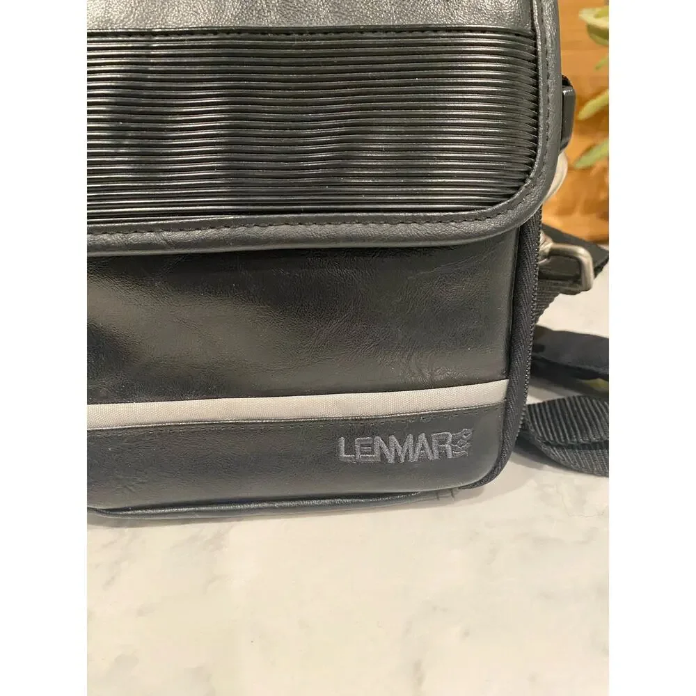 Lenmar faux leather shoulder camera bag hand held or shoulder strap vintage?